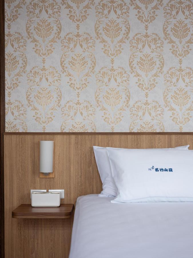 名竹旅社 Minzu Hotel Lộc Cốc Ngoại thất bức ảnh